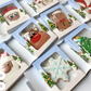 “Season’s Greetings” Double Cookie Box – 4″ x 5″ x 3/4″  made by Miss Cookie Packaging 1 pezzo